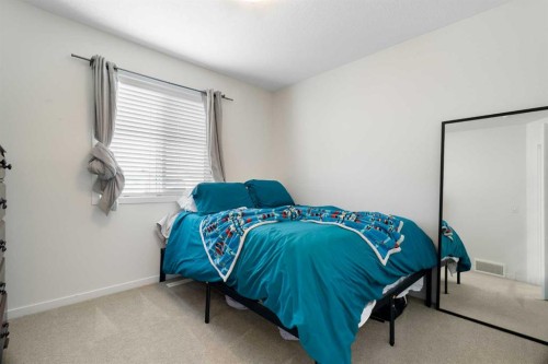 57 Amery Crescent, Crossfield, AB - Indoor Photo Showing Bedroom