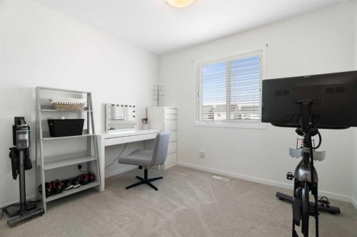 57 Amery Crescent, Crossfield, AB - Indoor Photo Showing Gym Room