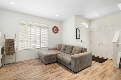 57 Amery Crescent, Crossfield, AB - Indoor Photo Showing Living Room