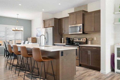 57 Amery Crescent, Crossfield, AB - Indoor Photo Showing Kitchen With Stainless Steel Kitchen With Upgraded Kitchen