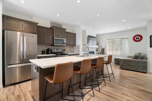 57 Amery Crescent, Crossfield, AB - Indoor Photo Showing Kitchen With Stainless Steel Kitchen With Upgraded Kitchen