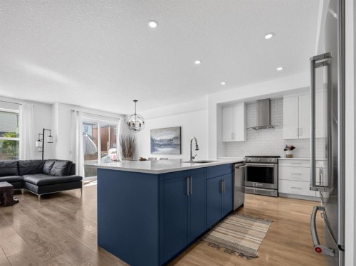 228 Masters Crescent Se, Calgary, AB - Indoor Photo Showing Kitchen With Stainless Steel Kitchen With Upgraded Kitchen