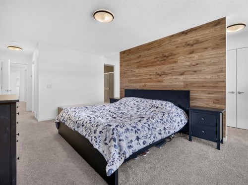 228 Masters Crescent Se, Calgary, AB - Indoor Photo Showing Bedroom