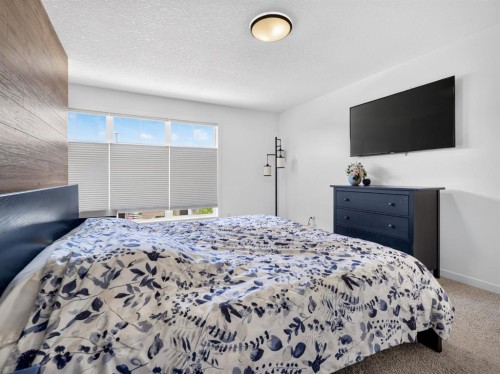 228 Masters Crescent Se, Calgary, AB - Indoor Photo Showing Bedroom