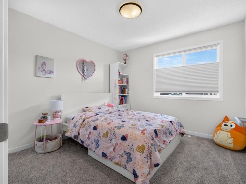 228 Masters Crescent Se, Calgary, AB - Indoor Photo Showing Bedroom