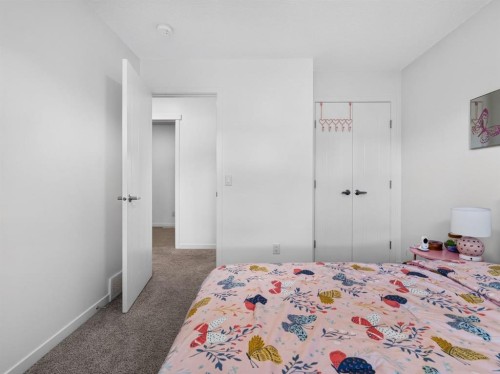228 Masters Crescent Se, Calgary, AB - Indoor Photo Showing Bedroom