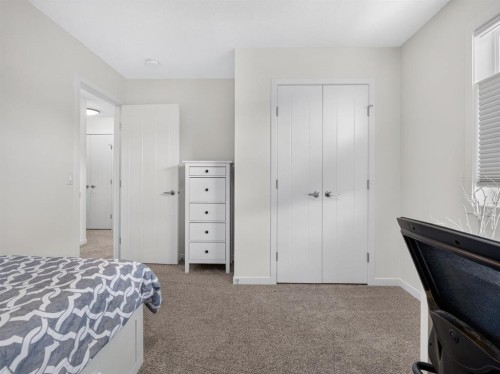 228 Masters Crescent Se, Calgary, AB - Indoor Photo Showing Bedroom