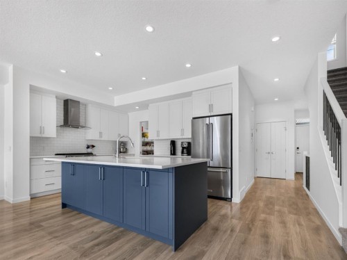 228 Masters Crescent Se, Calgary, AB - Indoor Photo Showing Kitchen With Stainless Steel Kitchen With Upgraded Kitchen