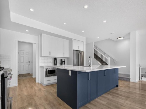 228 Masters Crescent Se, Calgary, AB - Indoor Photo Showing Kitchen With Upgraded Kitchen