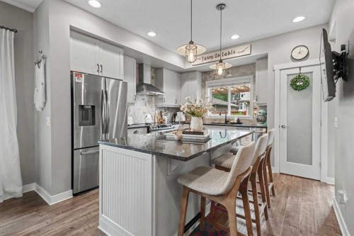 99 Mahogany Row Se, Calgary, AB - Indoor Photo Showing Kitchen With Stainless Steel Kitchen With Upgraded Kitchen
