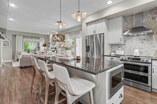 99 Mahogany Row Se, Calgary, AB - Indoor Photo Showing Kitchen With Stainless Steel Kitchen With Upgraded Kitchen
