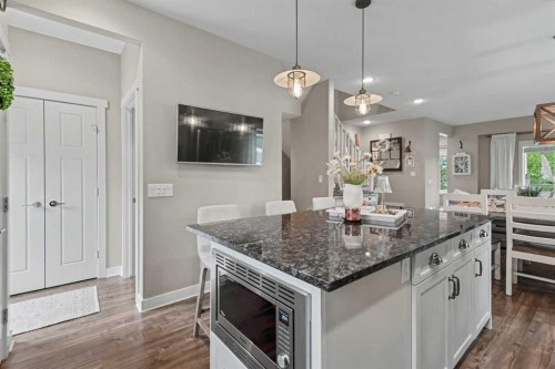 99 Mahogany Row Se, Calgary, AB - Indoor Photo Showing Kitchen With Upgraded Kitchen