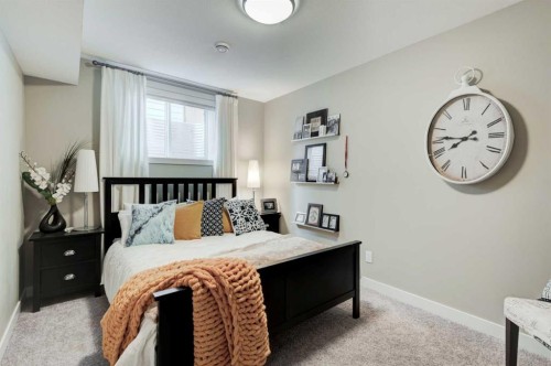 99 Mahogany Row Se, Calgary, AB - Indoor Photo Showing Bedroom