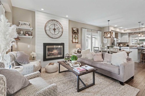 99 Mahogany Row Se, Calgary, AB - Indoor Photo Showing Living Room With Fireplace