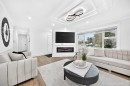 615 Marian Crescent Ne, Calgary, AB  - Indoor Photo Showing Living Room With Fireplace 