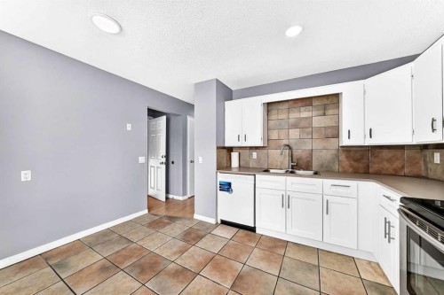 514 Whitehill Place Ne, Calgary, AB - Indoor Photo Showing Kitchen With Double Sink