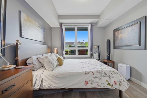 1106-175 Silverado Boulevard Sw, Calgary, AB - Indoor Photo Showing Bedroom