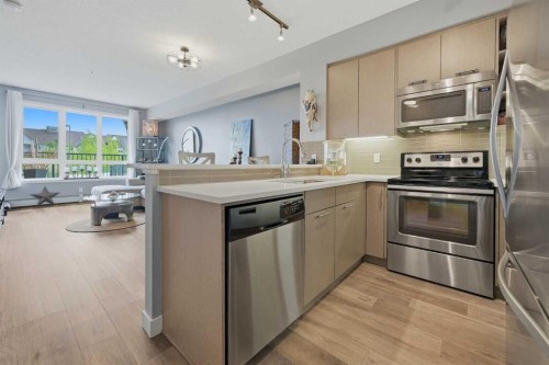 1106-175 Silverado Boulevard Sw, Calgary, AB - Indoor Photo Showing Kitchen
