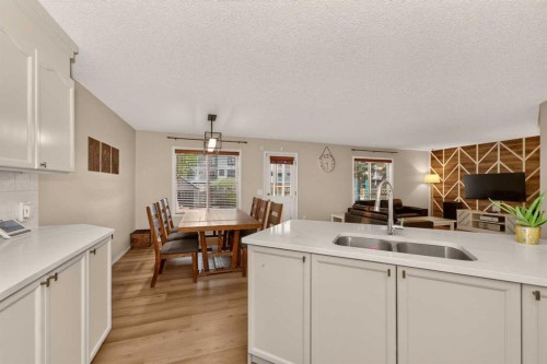 137 Douglas Glen Manor Se, Calgary, AB - Indoor Photo Showing Kitchen With Double Sink