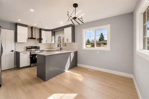 755 Penbrooke Road Se, Calgary, AB - Indoor Photo Showing Kitchen With Upgraded Kitchen