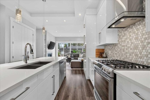 3127 44 Street Sw, Calgary, AB - Indoor Photo Showing Kitchen With Double Sink With Upgraded Kitchen