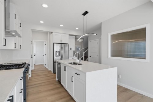 212 Lewiston Landing Ne, Calgary, AB - Indoor Photo Showing Kitchen With Double Sink With Upgraded Kitchen