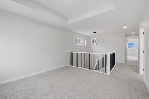 212 Lewiston Landing Ne, Calgary, AB - Indoor Photo Showing Other Room
