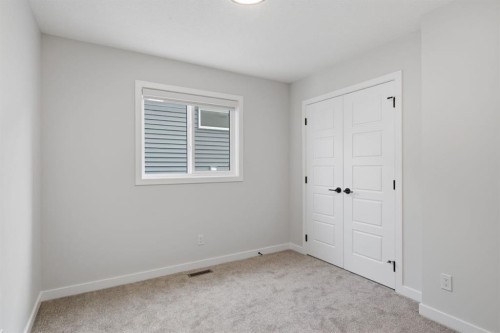 212 Lewiston Landing Ne, Calgary, AB - Indoor Photo Showing Other Room