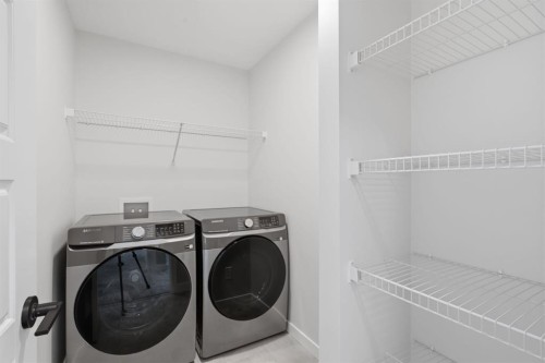212 Lewiston Landing Ne, Calgary, AB - Indoor Photo Showing Laundry Room