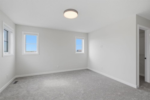 212 Lewiston Landing Ne, Calgary, AB - Indoor Photo Showing Other Room