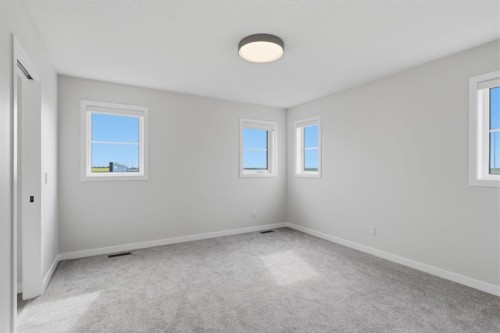 212 Lewiston Landing Ne, Calgary, AB - Indoor Photo Showing Other Room