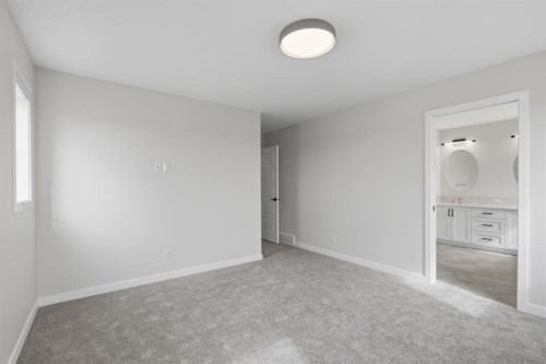 212 Lewiston Landing Ne, Calgary, AB - Indoor Photo Showing Other Room