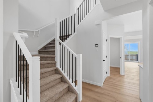 212 Lewiston Landing Ne, Calgary, AB - Indoor Photo Showing Other Room