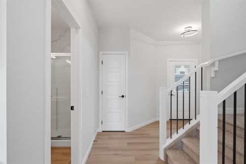212 Lewiston Landing Ne, Calgary, AB - Indoor Photo Showing Other Room