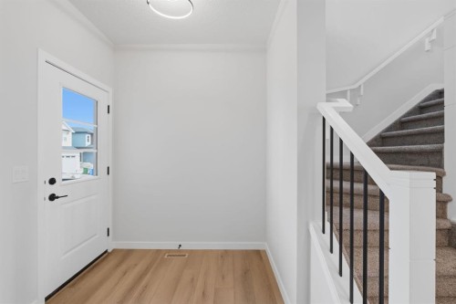 212 Lewiston Landing Ne, Calgary, AB - Indoor Photo Showing Other Room