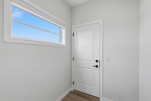 212 Lewiston Landing Ne, Calgary, AB - Indoor Photo Showing Other Room