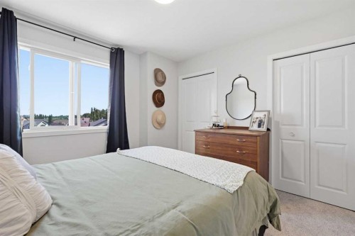 11 Park Lane, Didsbury, AB - Indoor Photo Showing Bedroom