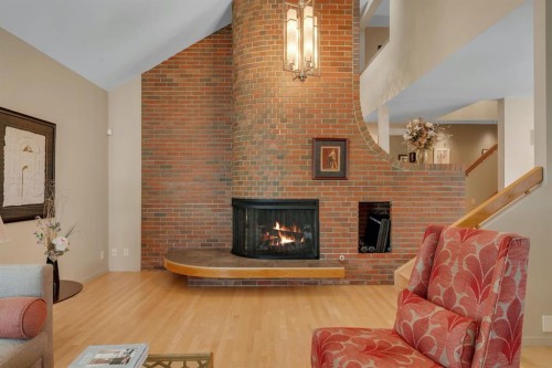 521 30 Avenue Sw, Calgary, AB - Indoor Photo Showing Living Room With Fireplace