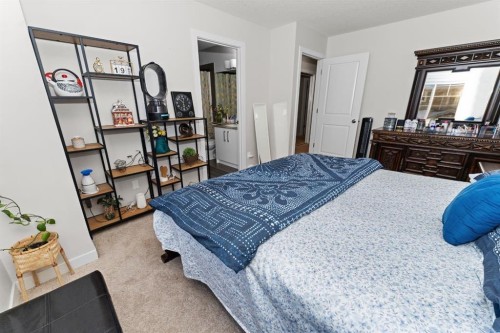 114-300 Marina Drive, Chestermere, AB - Indoor Photo Showing Bedroom