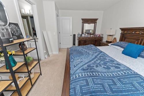 114-300 Marina Drive, Chestermere, AB - Indoor Photo Showing Bedroom