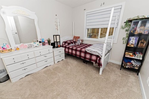 114-300 Marina Drive, Chestermere, AB - Indoor Photo Showing Bedroom