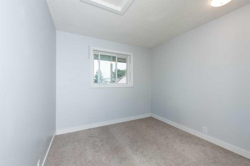 92 Martinwood Road Ne, Calgary, AB - Indoor Photo Showing Other Room