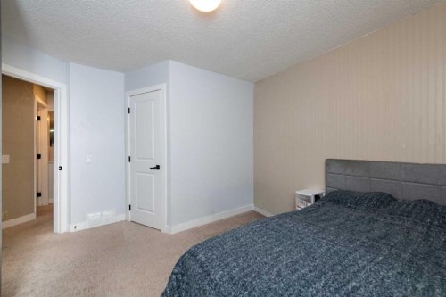 92 Martinwood Road Ne, Calgary, AB - Indoor Photo Showing Bedroom