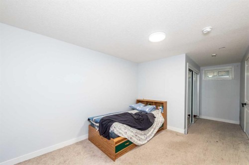 92 Martinwood Road Ne, Calgary, AB - Indoor Photo Showing Bedroom