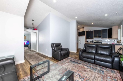 92 Martinwood Road Ne, Calgary, AB - Indoor Photo Showing Living Room