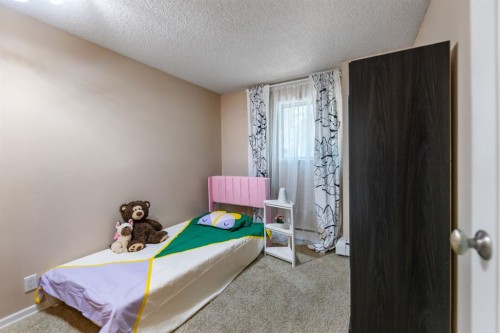 4-1607 26 Avenue Sw, Calgary, AB - Indoor Photo Showing Bedroom