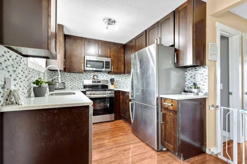 44 Falwood Crescent Ne, Calgary, AB - Indoor Photo Showing Kitchen With Upgraded Kitchen