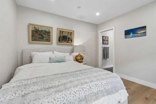 1414A 8 Avenue Se, Calgary, AB - Indoor Photo Showing Bedroom