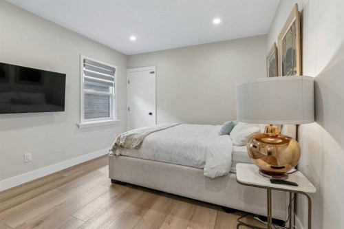 1414A 8 Avenue Se, Calgary, AB - Indoor Photo Showing Bedroom