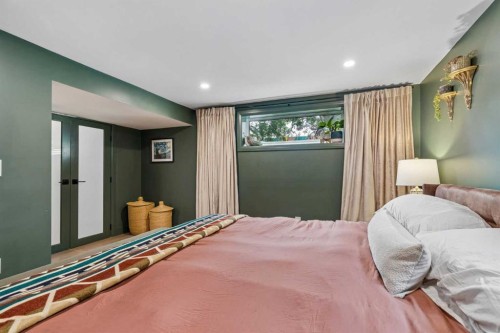 1414A 8 Avenue Se, Calgary, AB - Indoor Photo Showing Bedroom